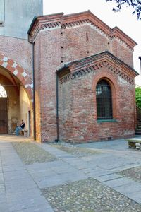 Man in front of building