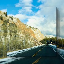 Road seen through car windshield