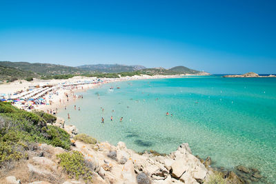 High angle view of beach against clear blue sky