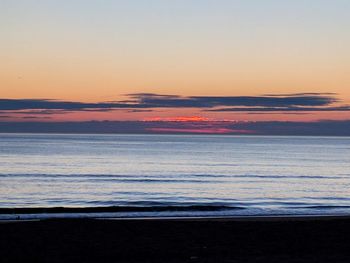 Scenic view of beach during sunset