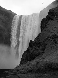 Scenic view of waterfall, skogafoss.