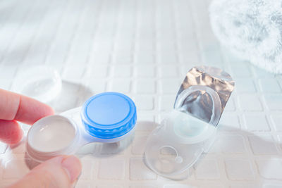 High angle view of person holding glass