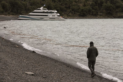 Rear view of man on beach