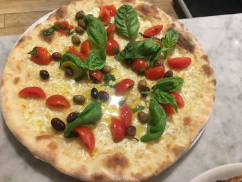 High angle view of pizza on table