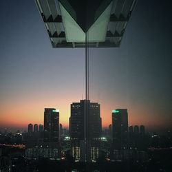 Illuminated cityscape at night