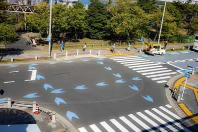 High angle view of people crossing road