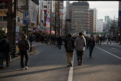 People walking on city street