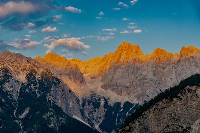 Panoramic view of snowcapped mountains against sky