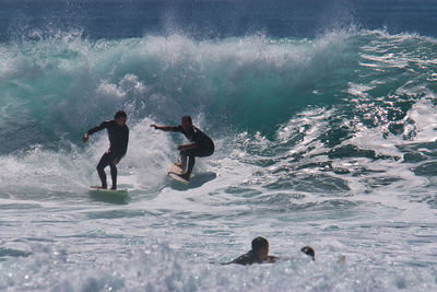 People enjoying in sea