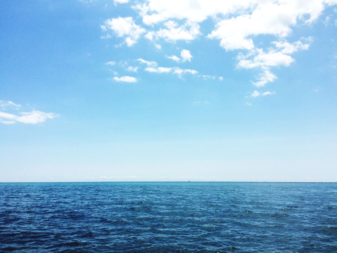 sea, waterfront, water, horizon over water, tranquil scene, scenics, tranquility, sky, beauty in nature, blue, rippled, nature, seascape, idyllic, cloud, day, cloud - sky, outdoors, ocean, no people