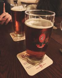 Close-up of beer glass on table