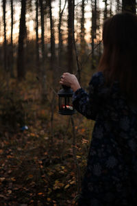 Woman holding ice cream cone