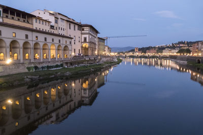 Arno river illuminated at night