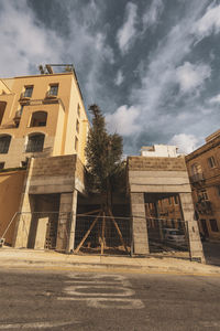 Low angle view of old building against sky