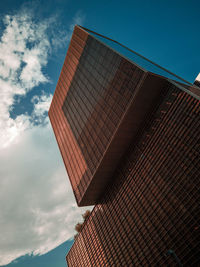 Low angle view of modern building against sky