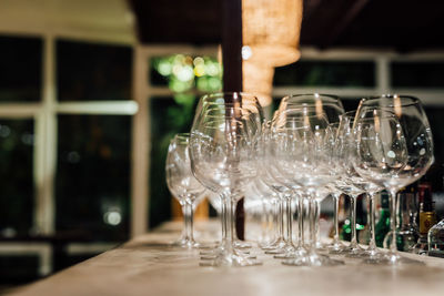 Luxury table settings for fine dining with and glassware, beautiful blurred background. 