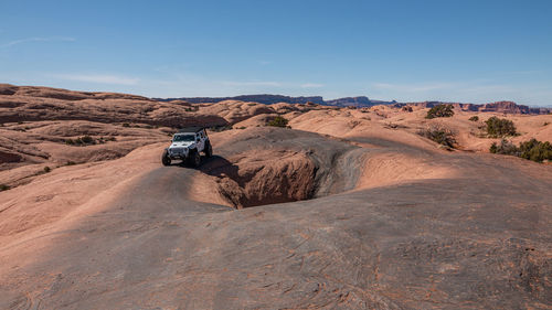 Full frame view of jeeps enjoying the rugged sandstone terrain