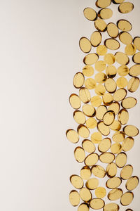 Close-up of pills against white background