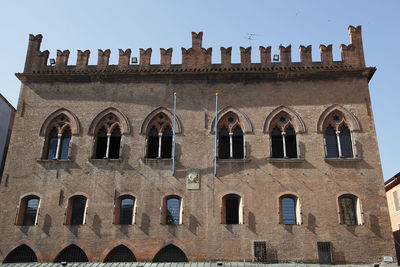 Low angle view of historical building against clear sky