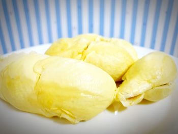 Close-up of lemon slice in plate