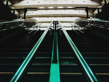 Low angle view of escalator in building