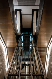 Low angle view of illuminated staircase in city