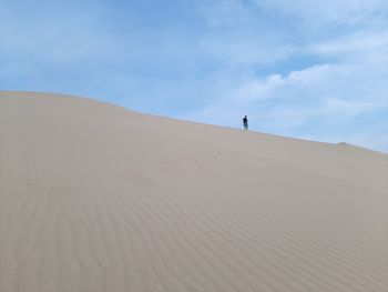 Scenic view of desert against sky