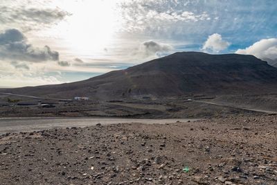 Scenic view of volcanic landscape against sky