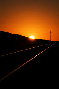 Scenic view of landscape at sunset