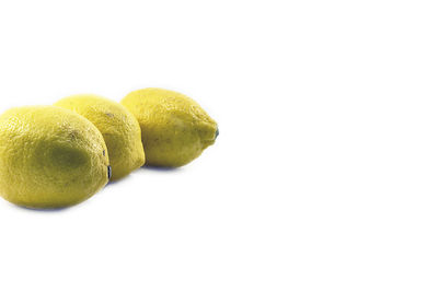 Close-up of fruits against white background