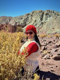 Young woman standing on mountain