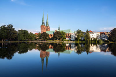 Reflection of buildings in lake