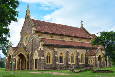 Exterior of historic building against sky