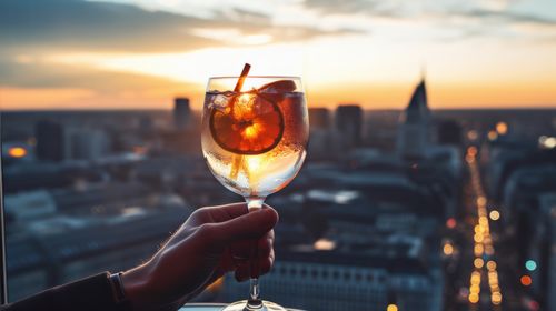 Cropped hand of woman holding wineglass