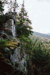 Scenic view of waterfall against sky