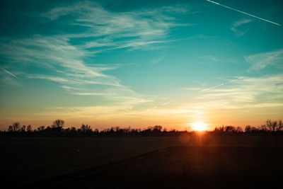 Scenic view of silhouette landscape against sky during sunset