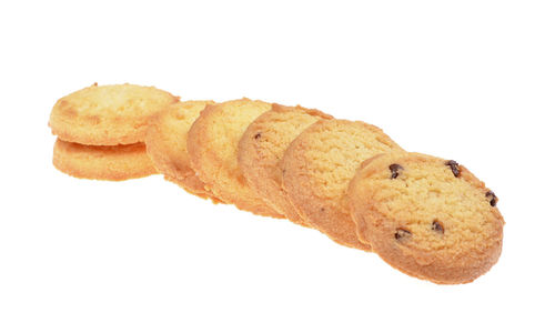 Close-up of cookies against white background