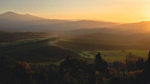 View over tuscany hills during sunset in autumn