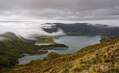 View over a large volcanic crater with lake in the evening light, azores, sao miguel, pico do fogo