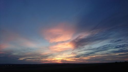 Scenic view of silhouette landscape against sky during sunset