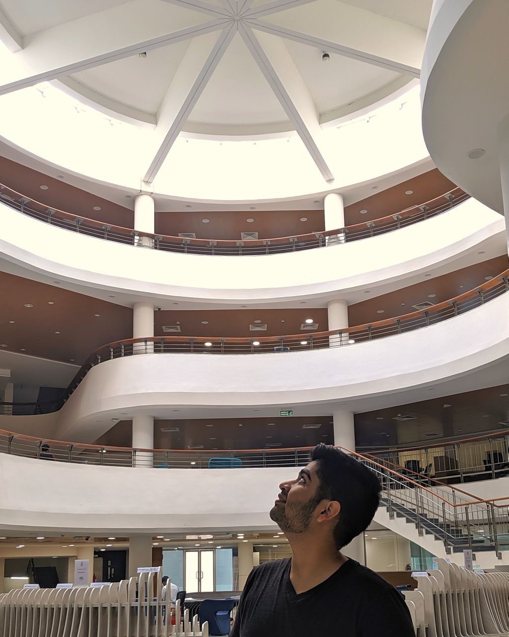 FULL LENGTH PORTRAIT OF YOUNG MAN STANDING IN CEILING