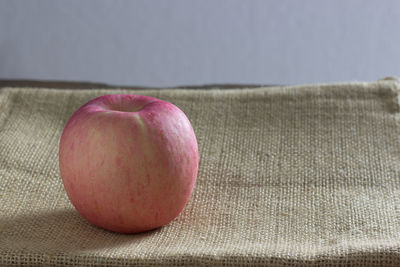 Close-up of apple on table