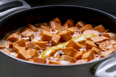 High angle view of sweet potatoes boiling