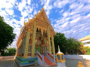 Low angle view of temple against building