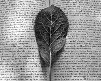 Close-up of heart shape on book