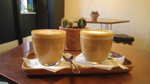 Close-up of coffee cup on table