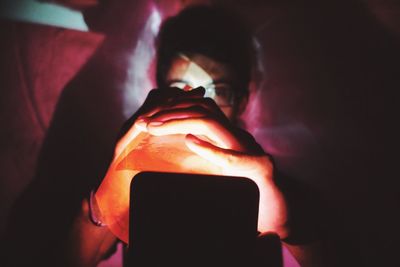 Close-up of hands using mobile phone