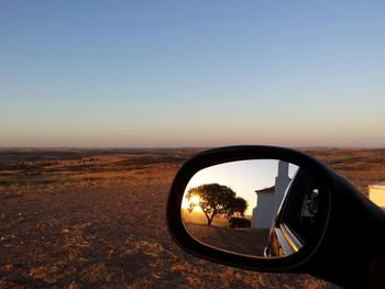 Reflection of cars on road