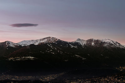 Scenic view of mountains against sky during sunset