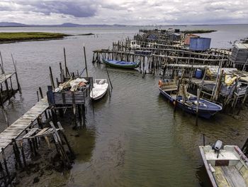 High angle view of boats moored at harbor